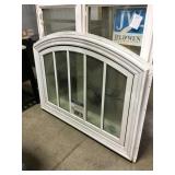 Jeld wen stationary arch top window.