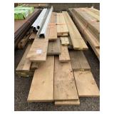 Mixed Pile of Treated Wood Boards for One Money