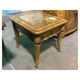 25in. X 29in. Glass top end table