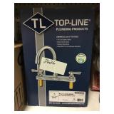 top-line brand deck mount 4" faucet.