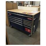 Husky 52in Mobile workbench. Dented.