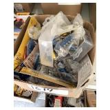 Box of key chain drill bit inserts.