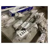 Four piece set of nickel 24 inch towel bars