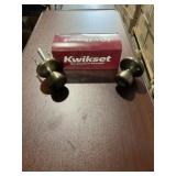 Kwikset® Tylo Entry Doorknob Set-Antique Brass x 4