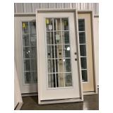 36in x 80in LH wood grain fiberglass 15 lite Door.