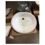 Oval undermount sink
