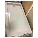 Porcelain shower base left drain.