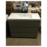 Light gray vanity with vanity top
