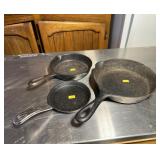 Three Cast Iron Skillets