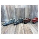 2 Lionel plastic caboose cars, two Lionel plastic