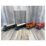 Lionel caboose, 2 dump cars, coal cars