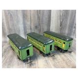 2 Lionel pullman 607 cars, one 608 rear car