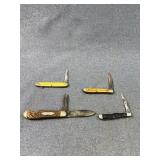 Four Folding Pocket Knives with Jigged Handles