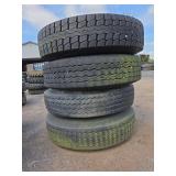 4 Bridgestone M810 Tires on Rims 10.00R20