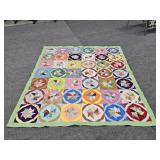 EARLY HANDMADE PIN WHEEL QUILT