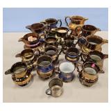 3 FLATS OF GOLD LUSTER PITCHERS & CREAMERS