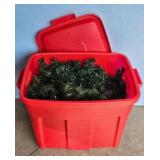 Red Storage Tote with Lid and Artificial Greenery