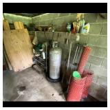 Propane Tank and Assorted Storage Items