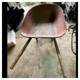 Used Red Metal Wheelbarrow