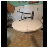 Round White Table with Black Metal Base and Stool