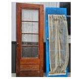Antique Wooden Door with Glass Panes and Blue Door