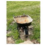 Used Metal Wheelbarrow with Black Handles and Whit