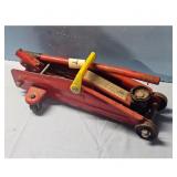 Vintage Red Hydraulic Floor Jack with Yellow Handl