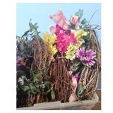 Decorative Floral and Twig Wreaths in Storage Bin