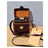 Tasco 7x20 Binoculars with Brown Leather Case