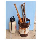 Bucket of Baseball Bats and Sprayer