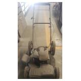 Push Lawn Mower with a Power Drive.