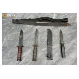 KA-BAR knives, sheath, and rifle slings. Includes
