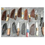 Ten Damascus steel fixed-blade knives. Very Good c