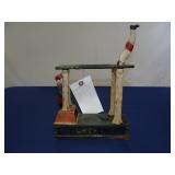 CAST IRON ACROBAT COIN BANK