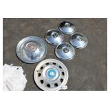 (4) FIAT HUB CAPS AND (2) OTHER HUB CAPS