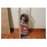 DOLL IN DISPLAY CASE