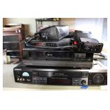 TWO VHS PLAYERS W/ REMOTES & MORE