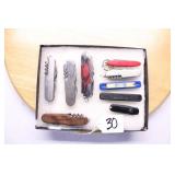 NINE SWISS ARMY STYLE KNIVES