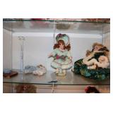 SHELF OF ASSORTED DOLLS