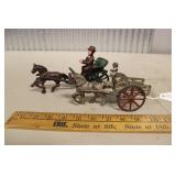(2) CAST IRON HORSE DRAWN WAGONS