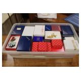 TOTE W/ LARGE ASSORTMENT OF BROCHES, PINS ETC.