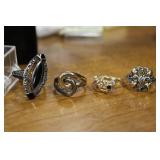 FOUR RINGS - ONE MARKED 585, OTHERS UNIDENTIFIABLE