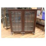 ANTIQUE TWO DOOR CLAWFOOT DISPLAY CABINET