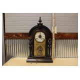 ANTIQUE MASCOT MANTLE CLOCK