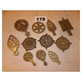 LOT OF BRASS TRIVETS LOT OF BRASS TRIVETS