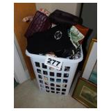 LAUNDRY BASKET FULL OF PURSES