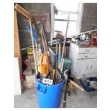 TRASH CAN FULL OF OUTDOOR TOOLS TRASH CAN FULL OF OUTDOOR TOOLS