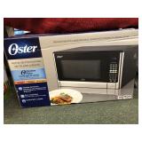 Oster 16 cu. ft. Countertop Microwave Oven,