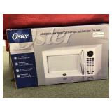 Oster 11 cu ft. Microwave Oven, open box, Oster 11 cu ft. Microwave Oven, open box,