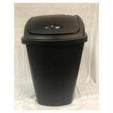 Black plastic tall kitchen garbage can